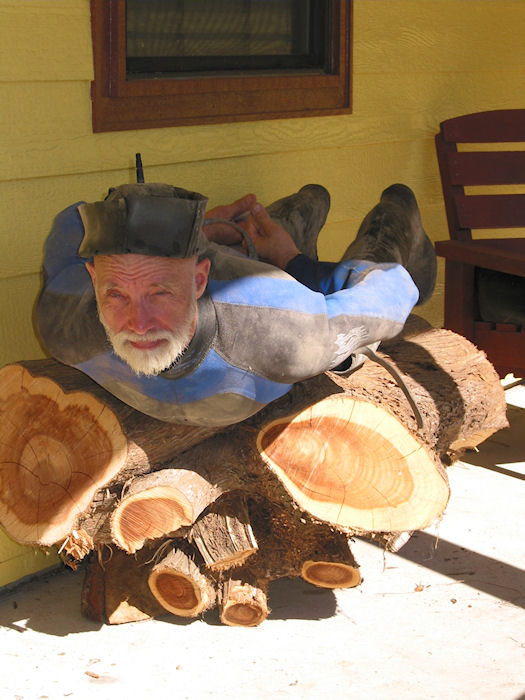 Cedar Log Surfing in a Heated Caverman's suit.