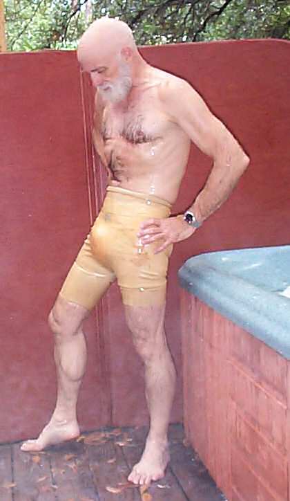 Amber latex trunks over layered jockstraps