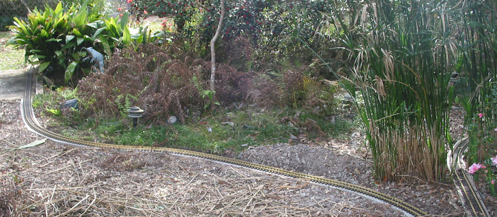 The Pewter Spitting Frog Guards the Bridge Over Lake Orin